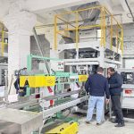 Two units 25kg pet food automatic weighing bagging conveying and palletizing line start running in our client factory